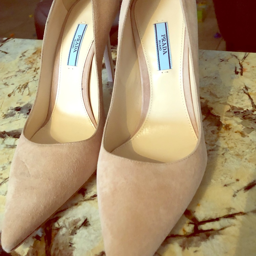 Prada nude pumps.
